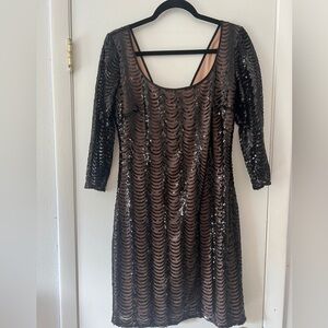 Black elegant sequin dress by Guess.
